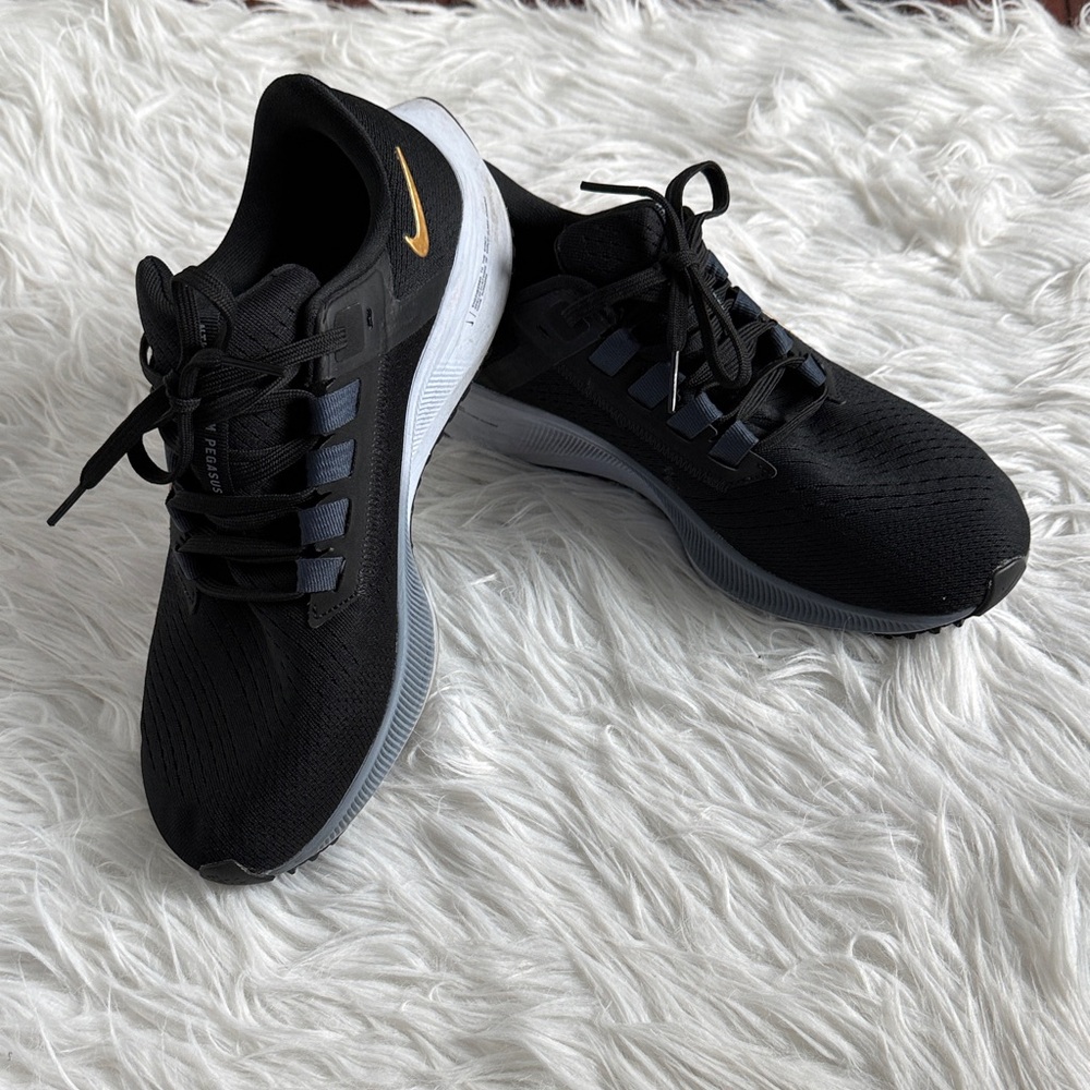Nike Black and Gold Running Shoes